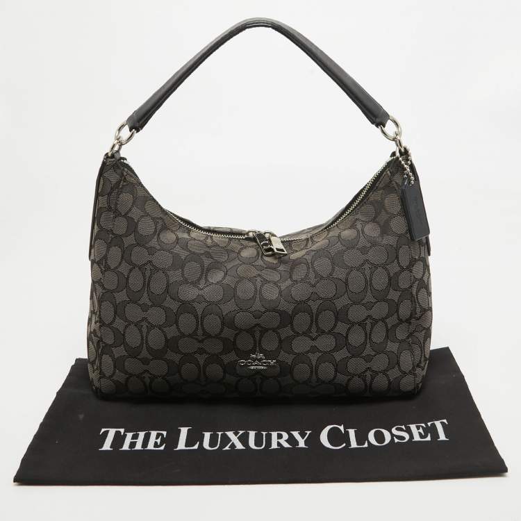 Pre Owned Coach Black/Dark Grey Signature Canvas East West Celeste Hobo