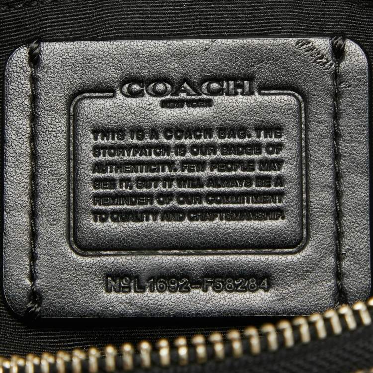 Pre Owned Coach Black/Dark Grey Signature Canvas East West Celeste Hobo