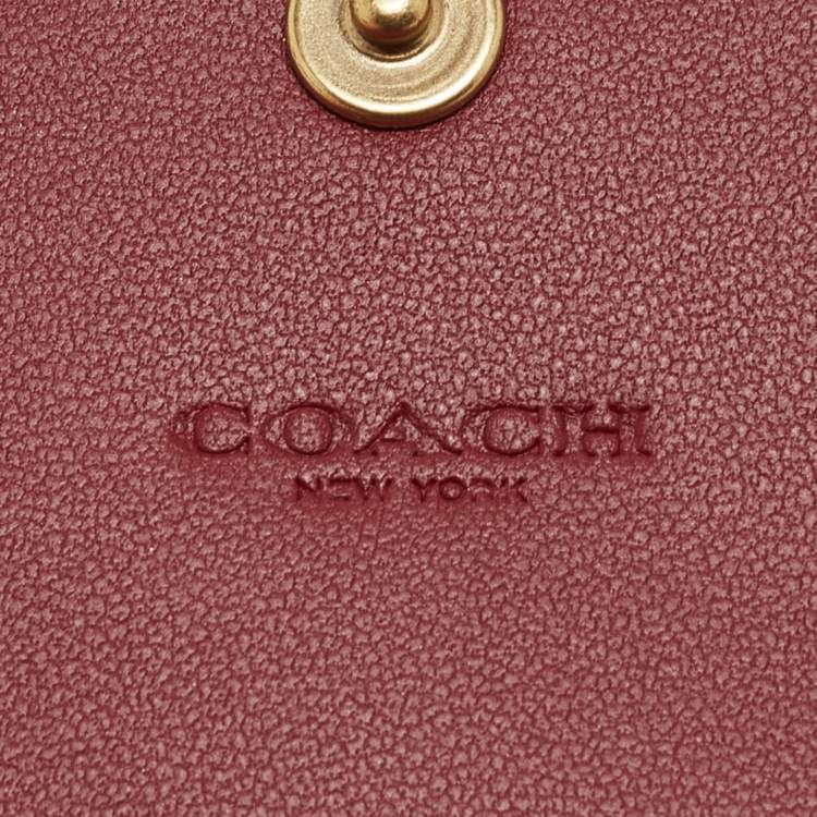 Pre Owned Coach Tricolor Signature Coated Canvas and Leather Small Wyn Wallet