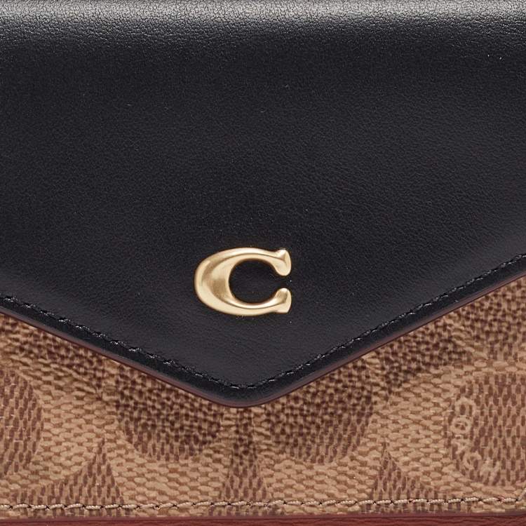Pre Owned Coach Tricolor Signature Coated Canvas and Leather Small Wyn Wallet