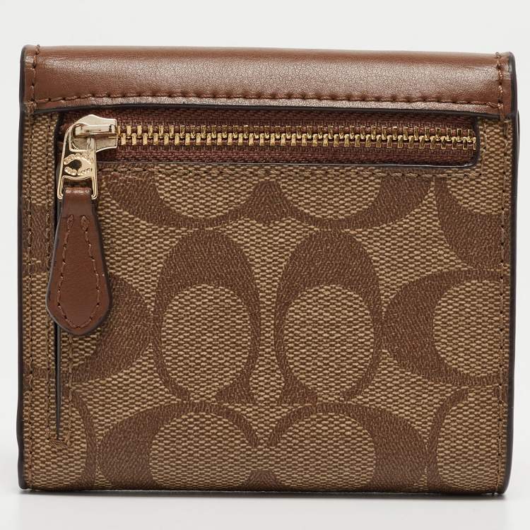 Pre Owned Coach Beige/Brown Signature Coated Canvas and Leather Trifold Wallet
