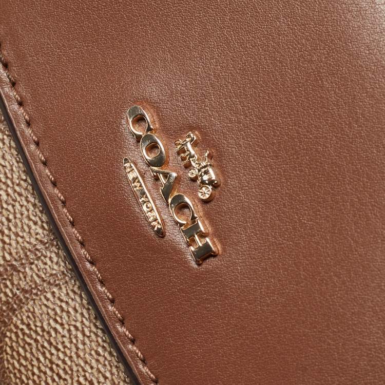 Pre Owned Coach Beige/Brown Signature Coated Canvas and Leather Trifold Wallet
