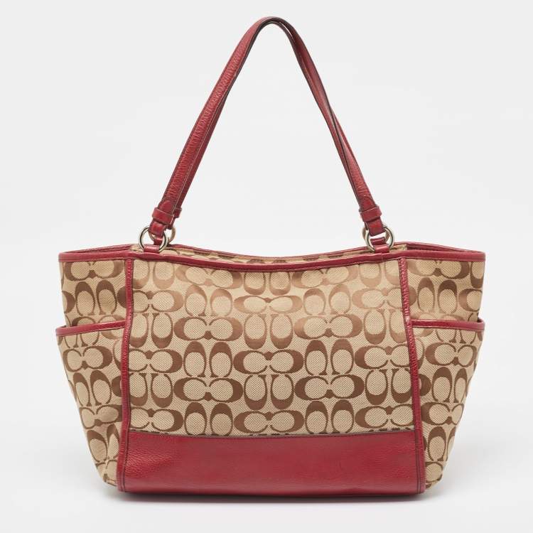 Pre Owned Coach Beige/Burgundy Signature Canvas and Leather Carrie Tote