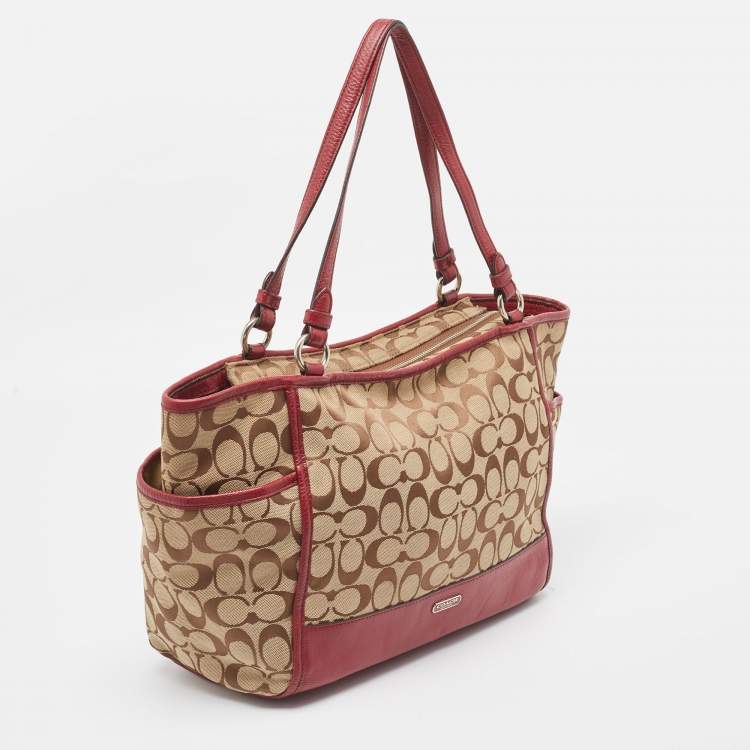 Pre Owned Coach Beige/Burgundy Signature Canvas and Leather Carrie Tote