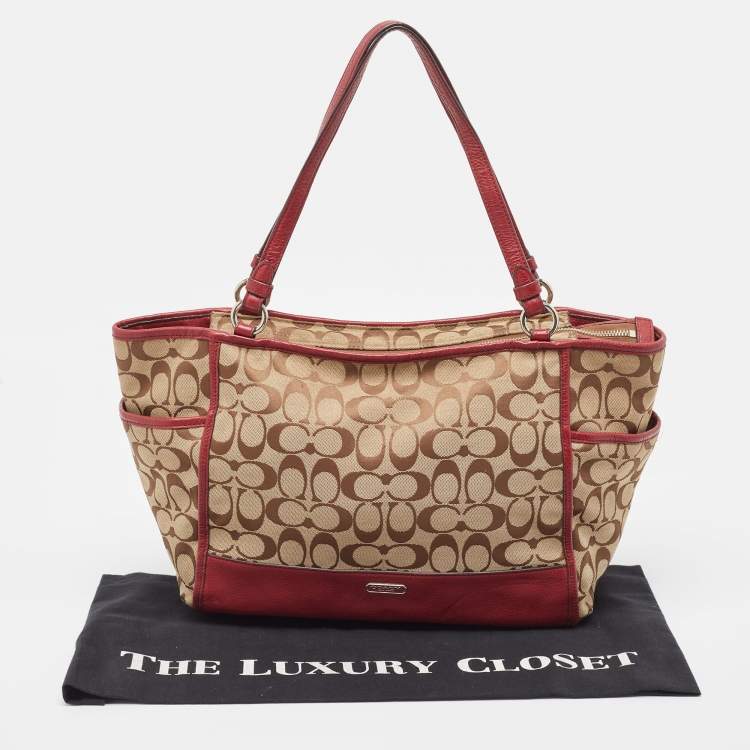 Pre Owned Coach Beige/Burgundy Signature Canvas and Leather Carrie Tote