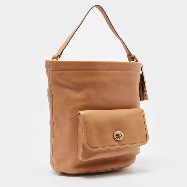 Pre Owned Coach Beige Leather Legacy Tassel Bucket Bag