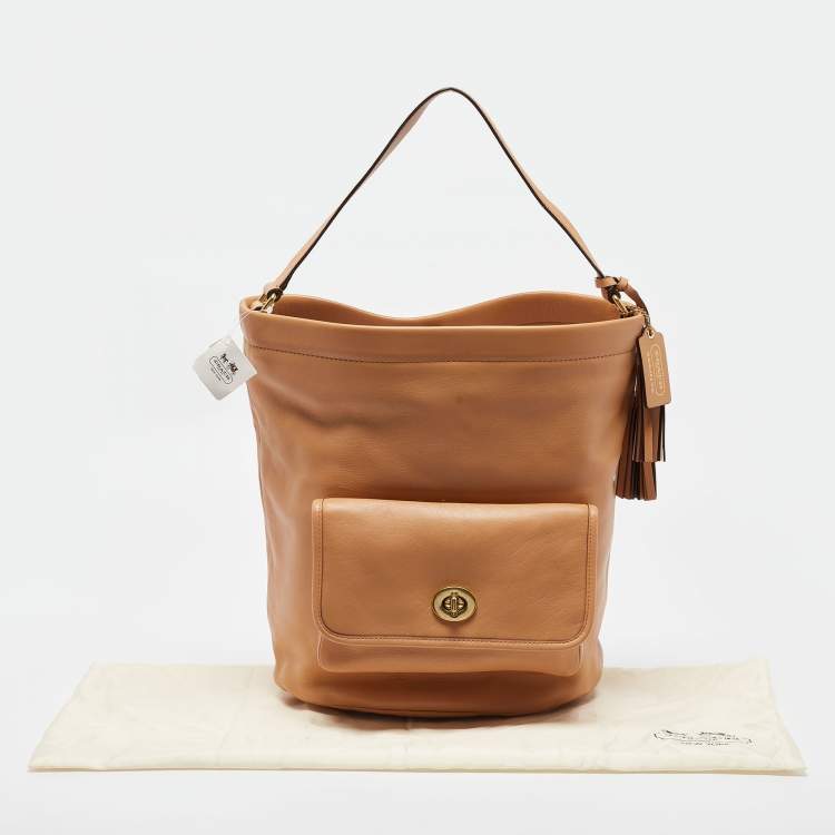 Pre Owned Coach Beige Leather Legacy Tassel Bucket Bag
