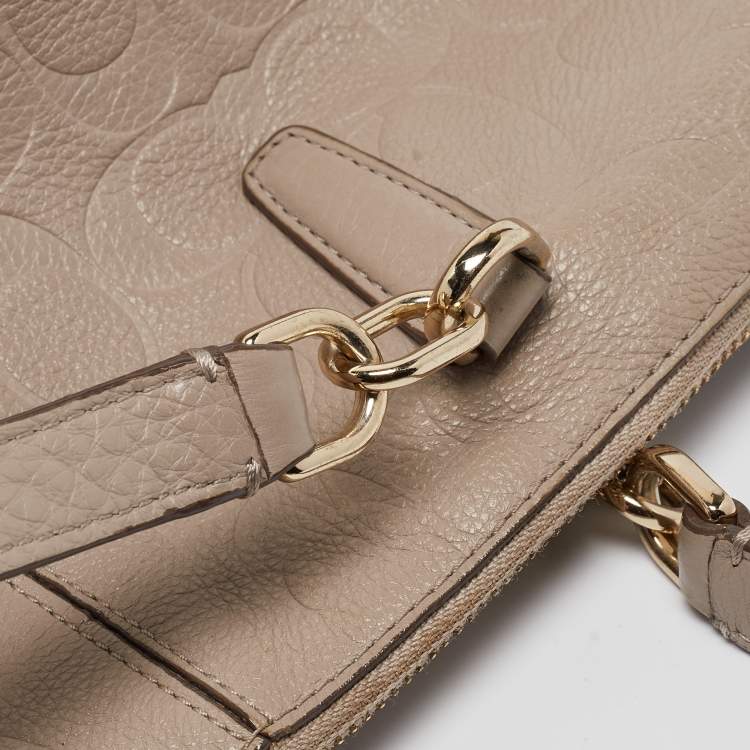 Pre Owned Coach Beige Signature Embossed Leather Bleecker Zip Tote