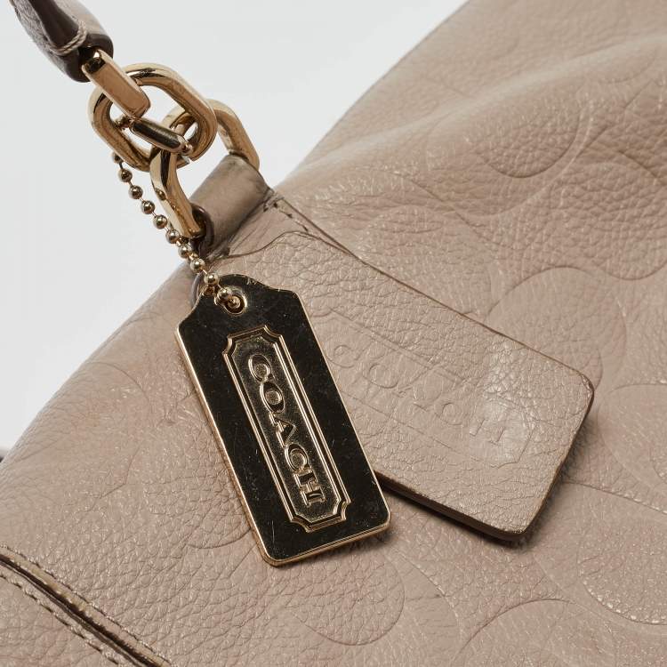 Pre Owned Coach Beige Signature Embossed Leather Bleecker Zip Tote