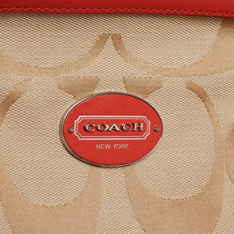 Pre Owned Coach Orange/Beige Signature Canvas and Leather Haley Satchel 