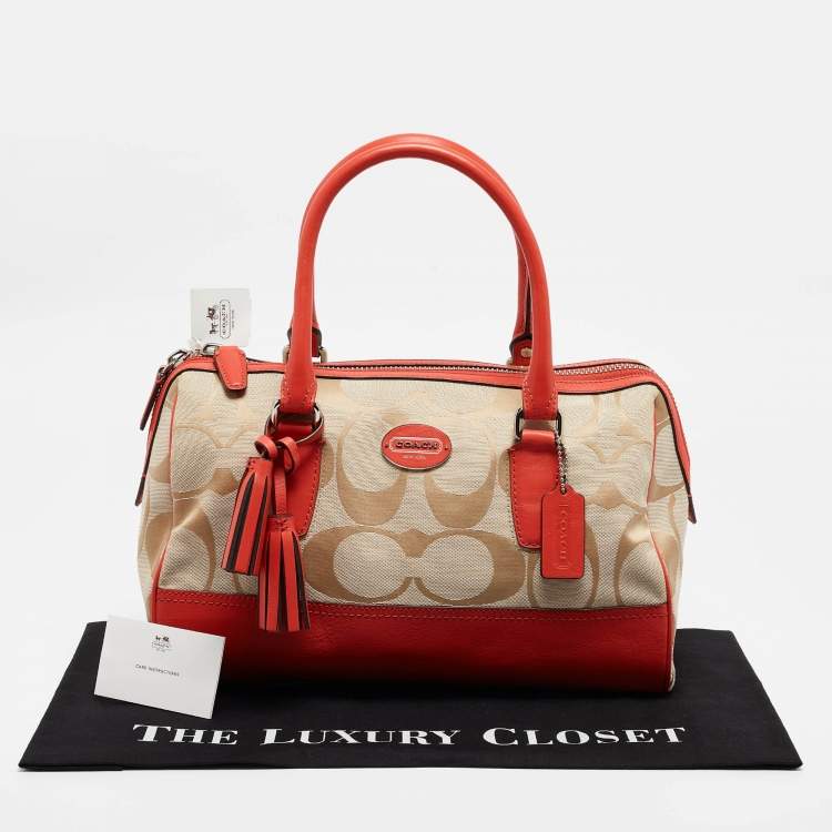 Pre Owned Coach Orange/Beige Signature Canvas and Leather Haley Satchel 