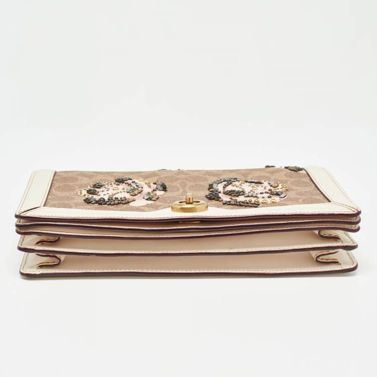 Pre Owned Coach Beoge/Old Rose Signature Coated Canvas and Leather Rose Embellished Riley Crossbody Bag