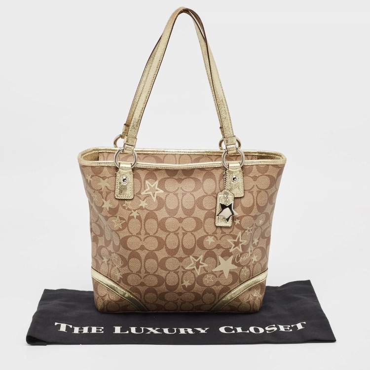 Pre Owned Coach Beige/Gold Signature Coated Canvas and Leather Heritage Star Tote