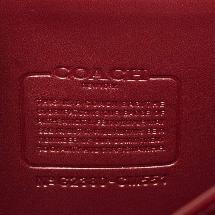 Pre Owned Coach Brown/Beige Signature Coated Canvas, Python Embossed and Leather Idol Bag