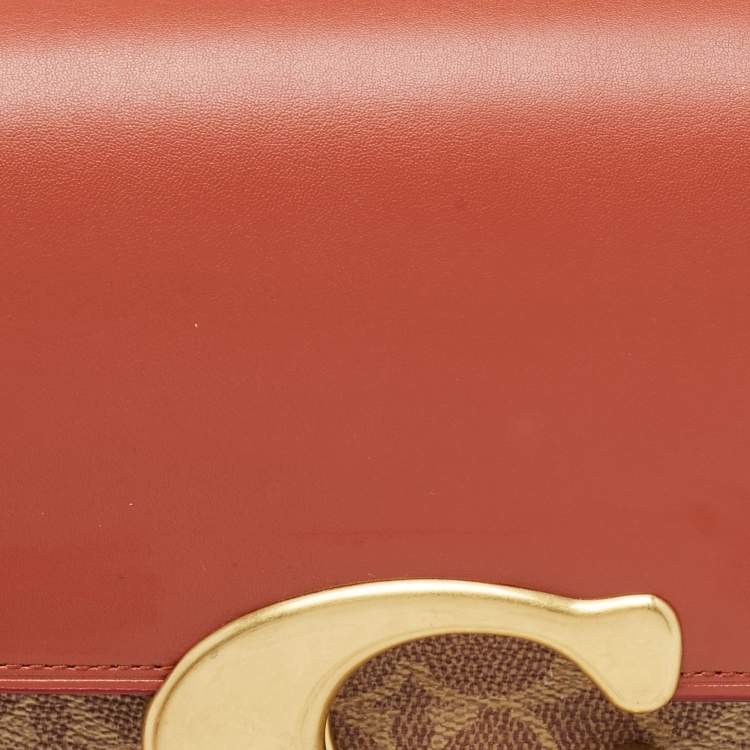 Pre Owned Coach Brown/Beige Signature Coated Canvas, Python Embossed and Leather Idol Bag