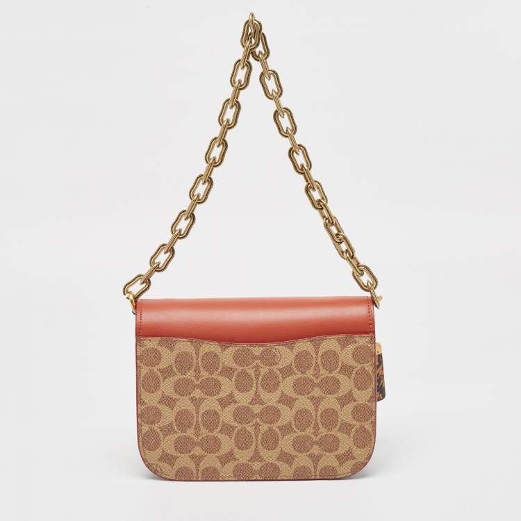 Pre Owned Coach Brown/Beige Signature Coated Canvas, Python Embossed and Leather Idol Bag