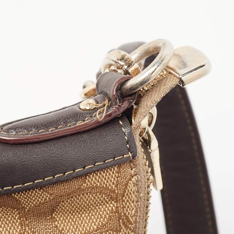 Pre Owned Coach Beige/Brown Signature Canvas and Leather Chelsea Hobo