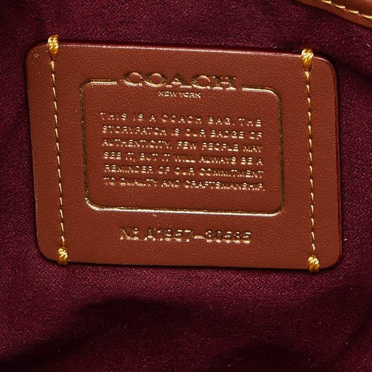 Pre Owned Coach Brown/Beige Signature Coated Canvas and Leather Parker Shoulder Bag