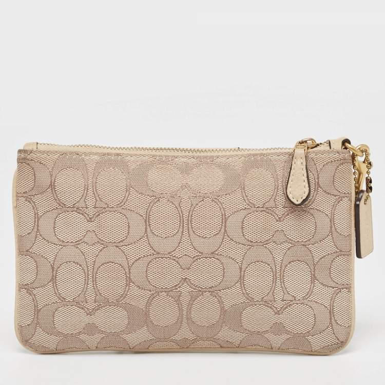 مملوكة مسبقًا Coach Beige Signature canvas and Leather Wristlet Zip Pouch