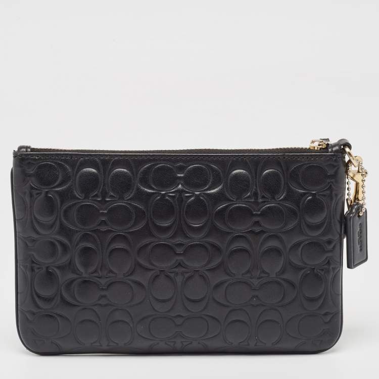 Pre Owned Coach Black Signature Embossed Leather Wristlet Pouch