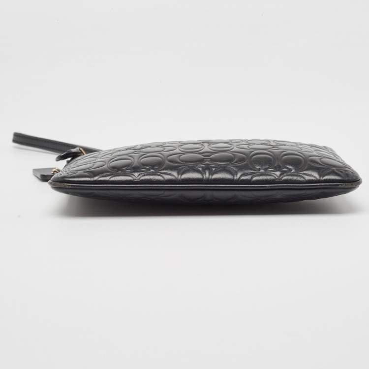 Pre Owned Coach Black Signature Embossed Leather Wristlet Pouch