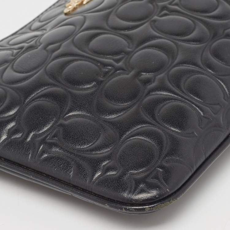 Pre Owned Coach Black Signature Embossed Leather Wristlet Pouch