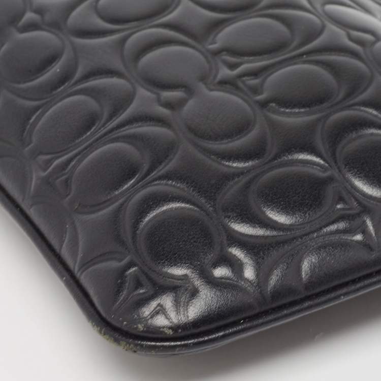 Pre Owned Coach Black Signature Embossed Leather Wristlet Pouch