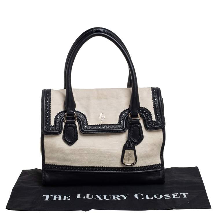 Pre Owned Cole Haan Cream/Black Canvas And Wingtip Leather Flap Brooke Tote 