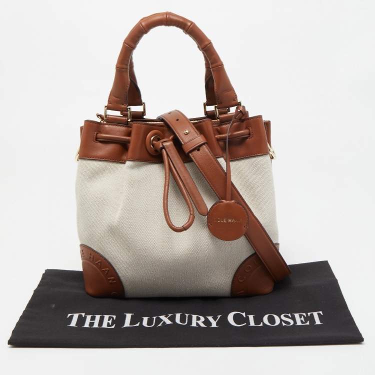 Pre Owned Cole Haan Beige/Tan Canvas and Leather Drawstring Bag