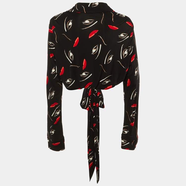 Pre Owned Diane Von Furstenberg Black Floating Face Print Jersey Wrap Around Bobbie Top XL 