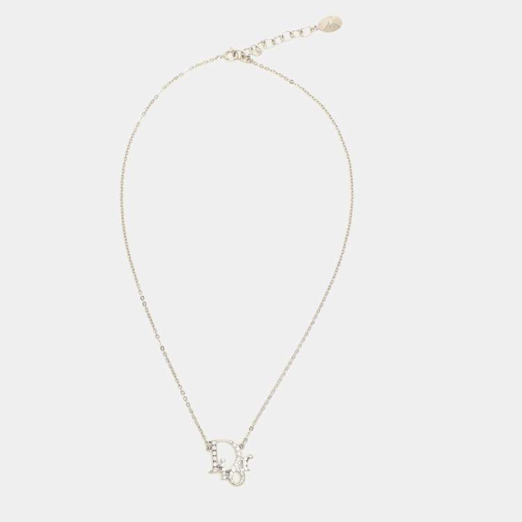 Pre Owned Dior Silver Tone Crystal Accented Logo Pendant Necklace