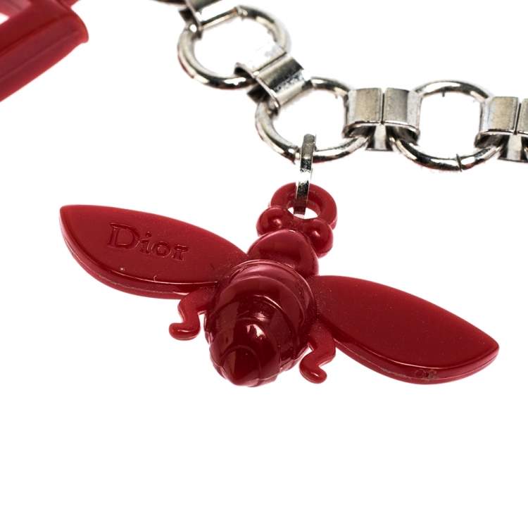 Pre Owned Dior Red Resin Multi Charm Silver Tone Link Bracelet