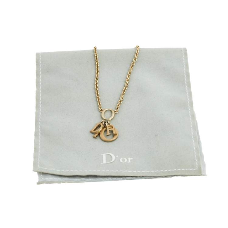 Pre Owned Dior Gold Tone Beige Enamel Logo Charm Necklace