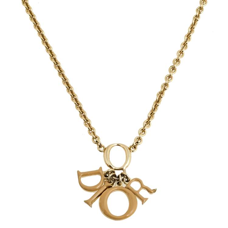Pre Owned Dior Gold Tone Beige Enamel Logo Charm Necklace