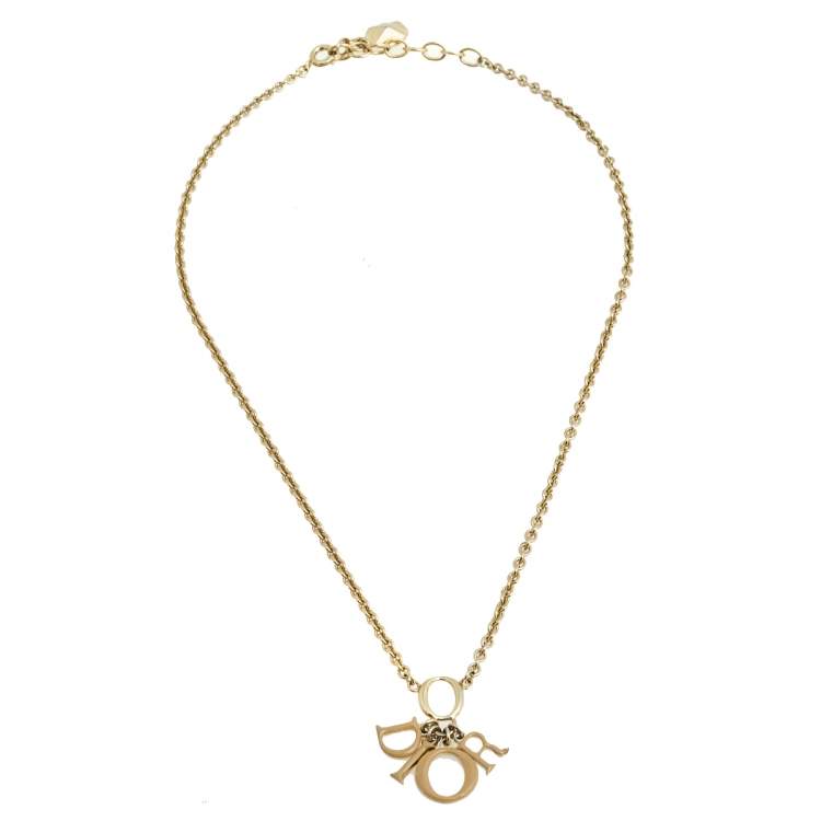 Pre Owned Dior Gold Tone Beige Enamel Logo Charm Necklace