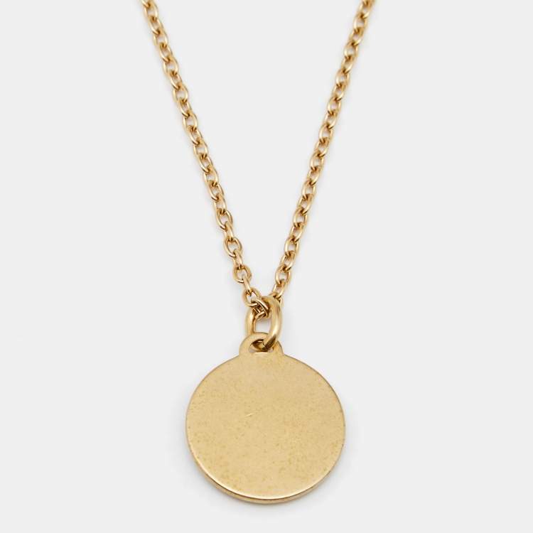 Pre Owned Dior Gold Tone Logo Embossed Round Pendant Necklace