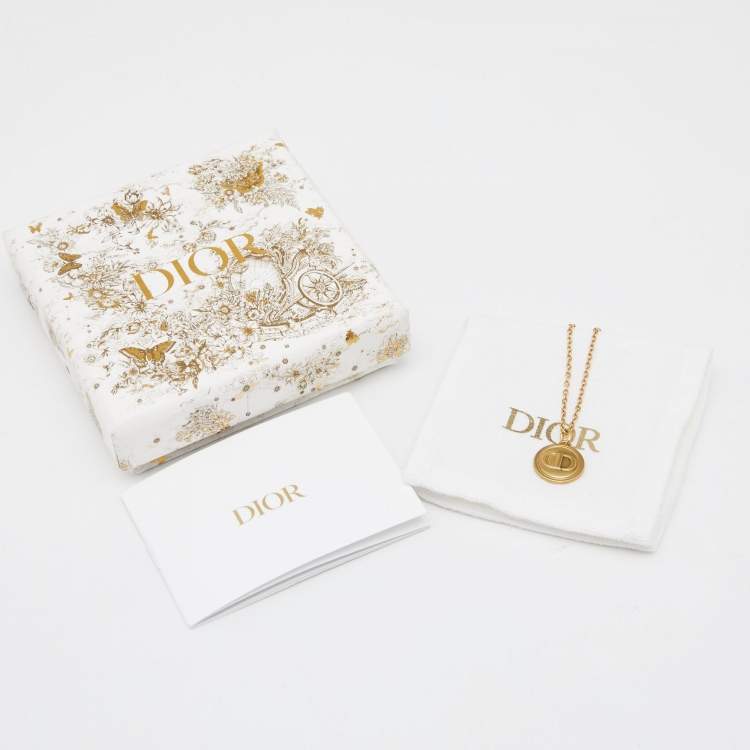 Pre Owned Dior Gold Tone Logo Embossed Round Pendant Necklace