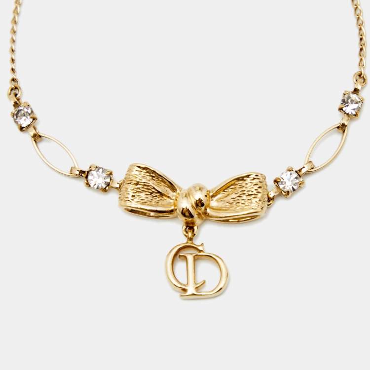 Pre Owned Dior Vintage Gold Tone Crystal Bow Charm Bracelet