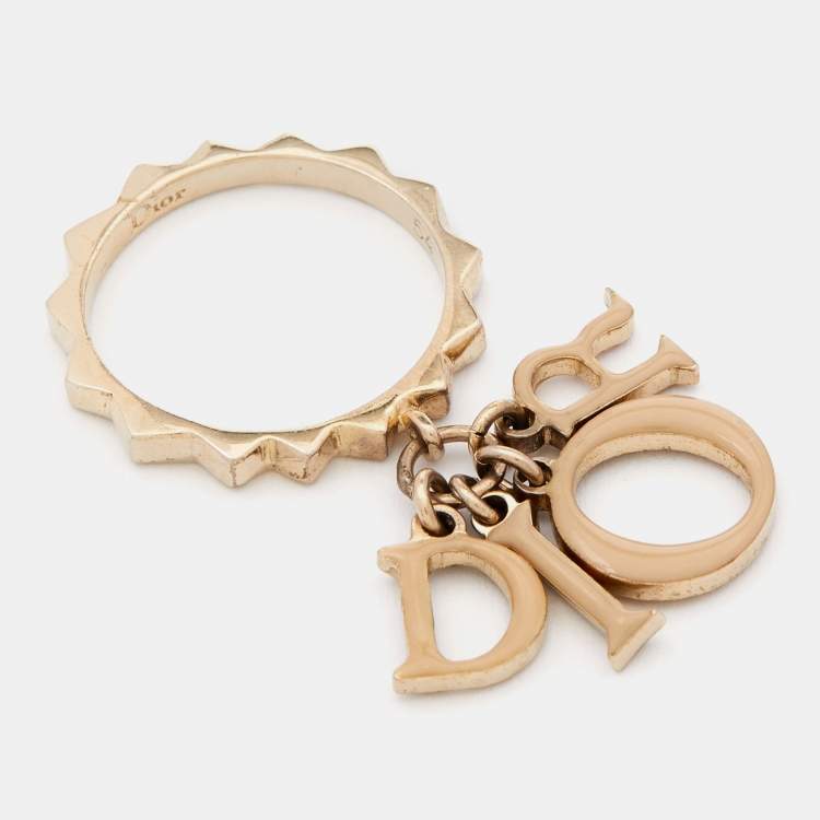 Pre Owned Dior Letters Charm Beige Enamel Gold Tone Ring Size 54