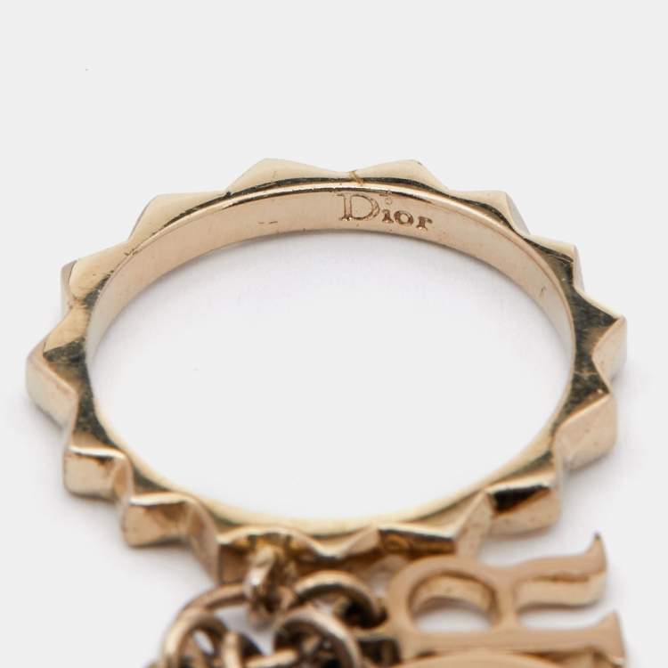 Pre Owned Dior Letters Charm Beige Enamel Gold Tone Ring Size 54