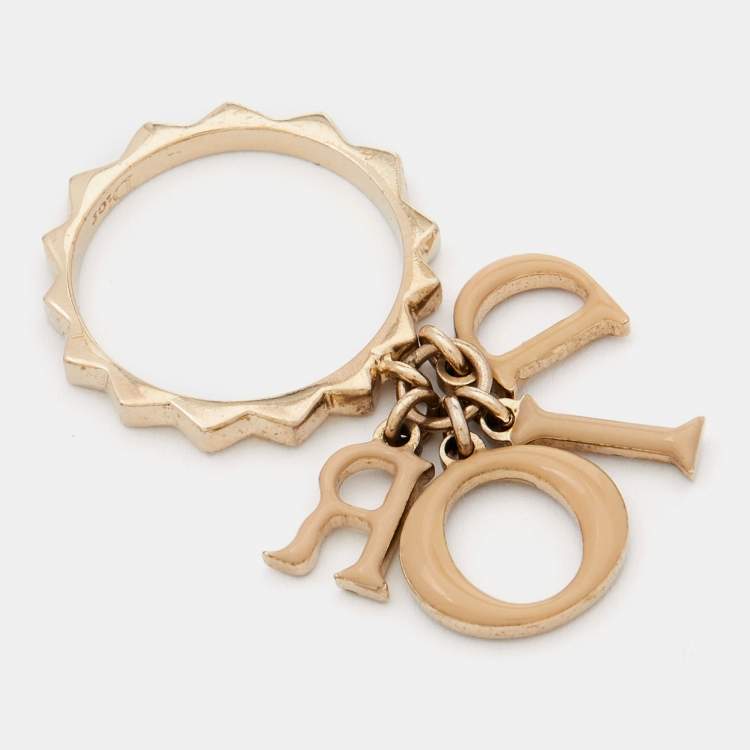 Pre Owned Dior Letters Charm Beige Enamel Gold Tone Ring Size 54