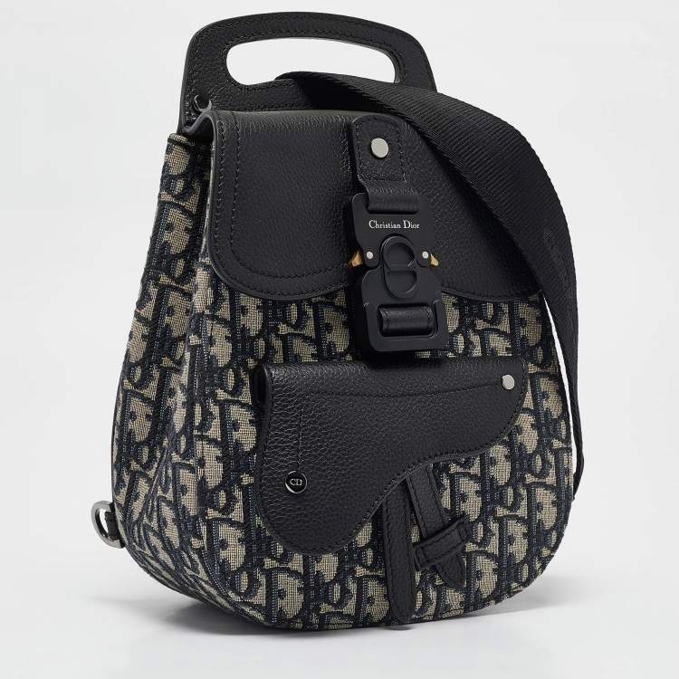 Pre Owned Dior Navy Blue Oblique Canvas and Leather Mini Saddle Backpack