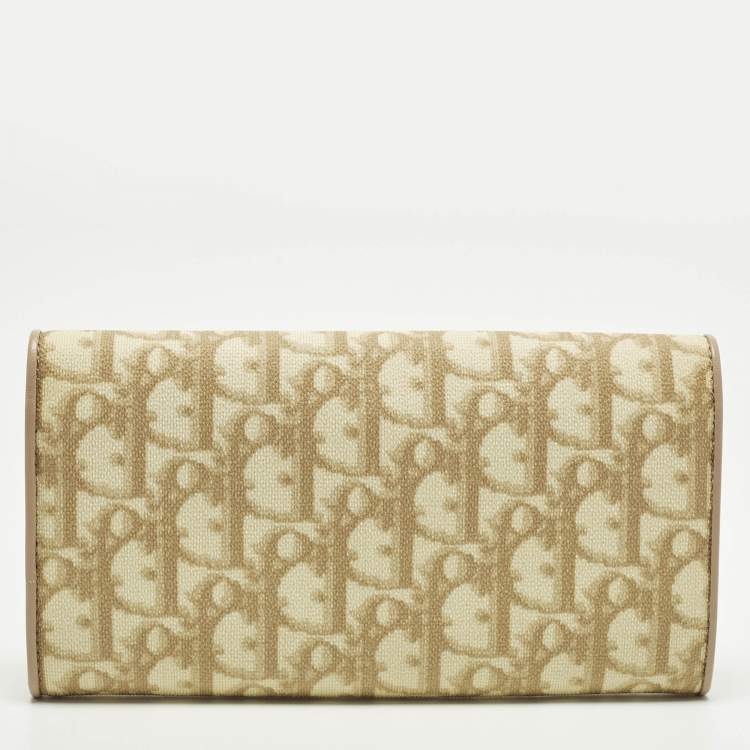 Pre Owned Dior Trotter Cream Oblique Coated Canvas Flap Continental Wallet