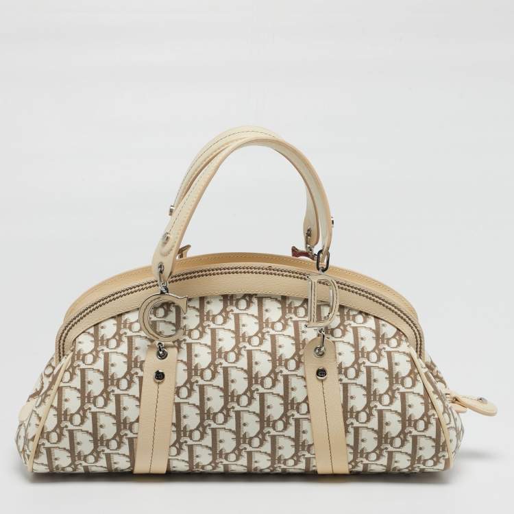 Pre Owned Dior Trotter Ivory/Beige Diorissimo Canvas and Leather Floral Embroidered Satchel
