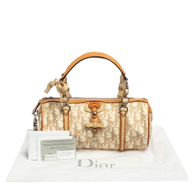 Pre Owned Dior White/Beige Trotter Coated Canvas and Leather Romantique Duffel Bag