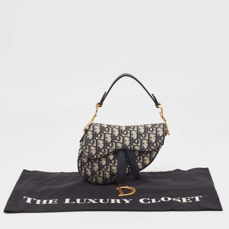 Pre Owned Dior Navy Blue Oblique Canvas and Leather Mini Saddle Bag