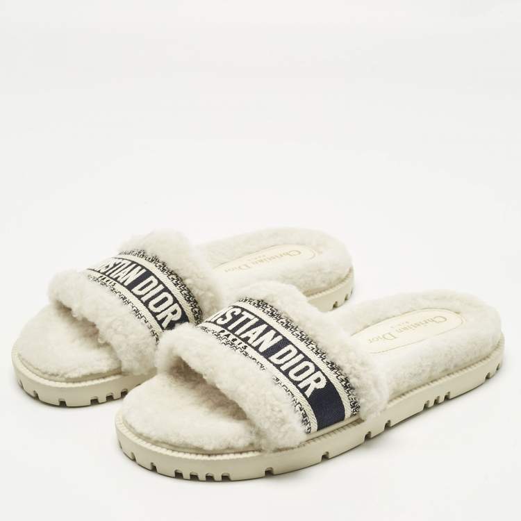 Pre Owned Dior White/Navy Blue Shearling Fur and Logo Canvas Dway Flat Slides Size 38