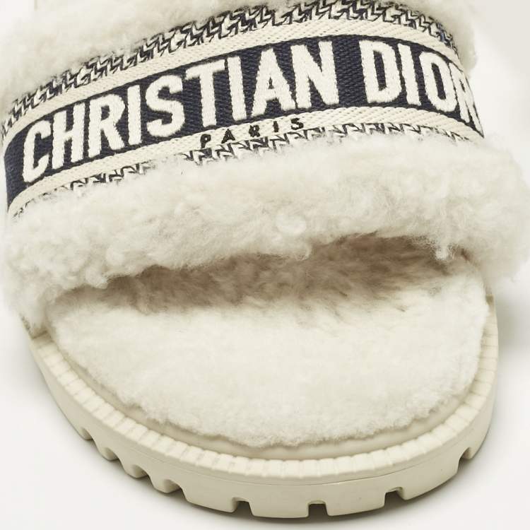 Pre Owned Dior White/Navy Blue Shearling Fur and Logo Canvas Dway Flat Slides Size 38