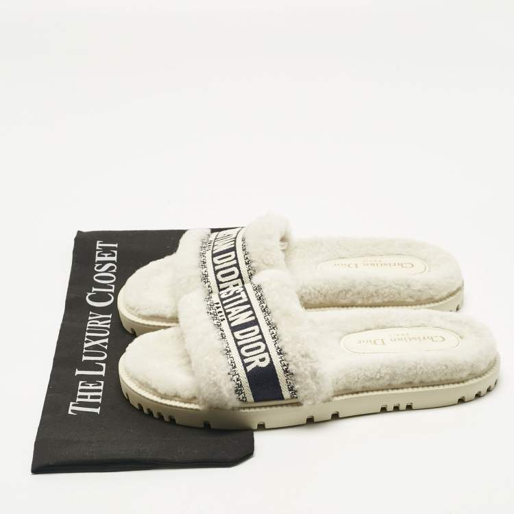 Pre Owned Dior White/Navy Blue Shearling Fur and Logo Canvas Dway Flat Slides Size 38