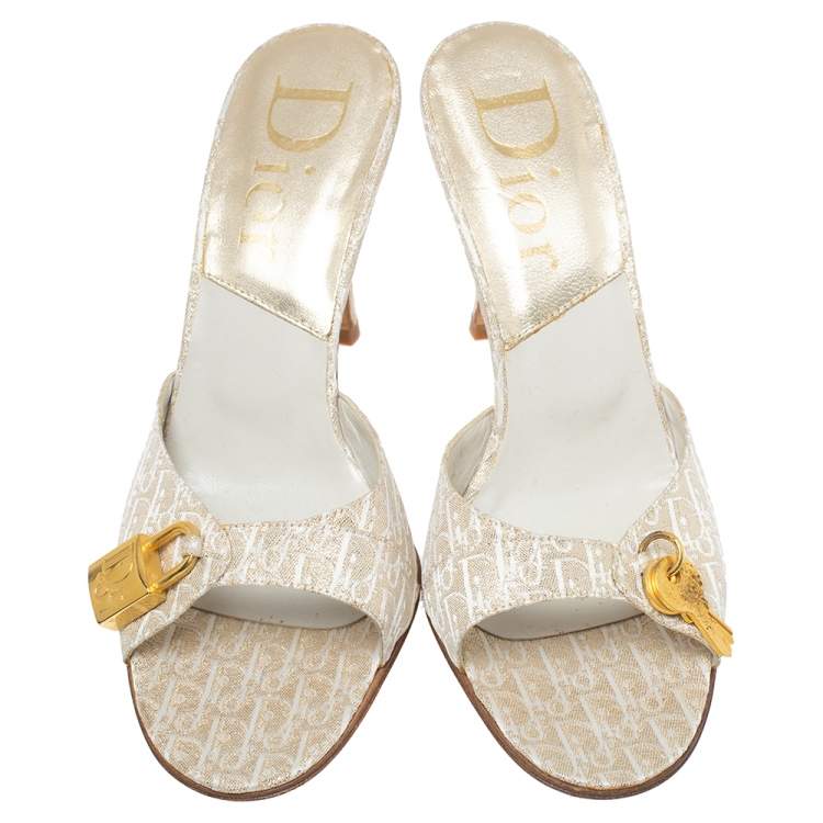 Pre Owned Dior Cream/Gold Diorissimo Canvas Lock And Key Embellished Slide Sandals Size 38.5